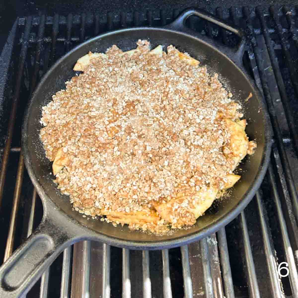 A cast iron apple crisp on the grill.