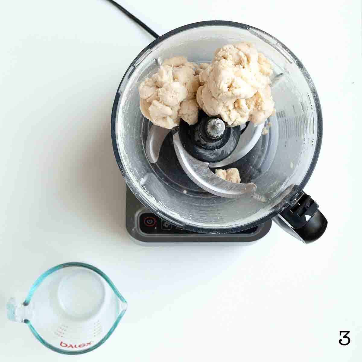 Pie dough in a food processor.