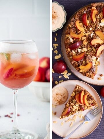 A glass of sangria and a plum cake with one slice removed.