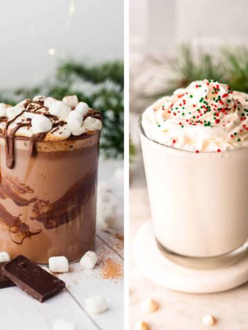 A mug of hot chocolate topped with marshmallows and a mug of white hot chocolate topped with whipped cream and sprinkles.