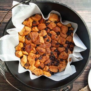 A Dutch oven filled with monkey bread.