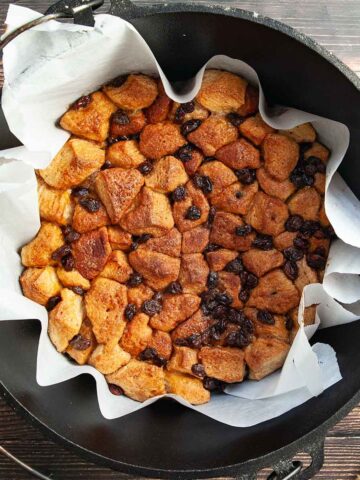 A Dutch oven filled with monkey bread.