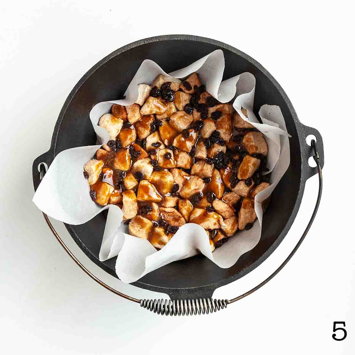 Uncooked monkey bread in a Dutch oven.