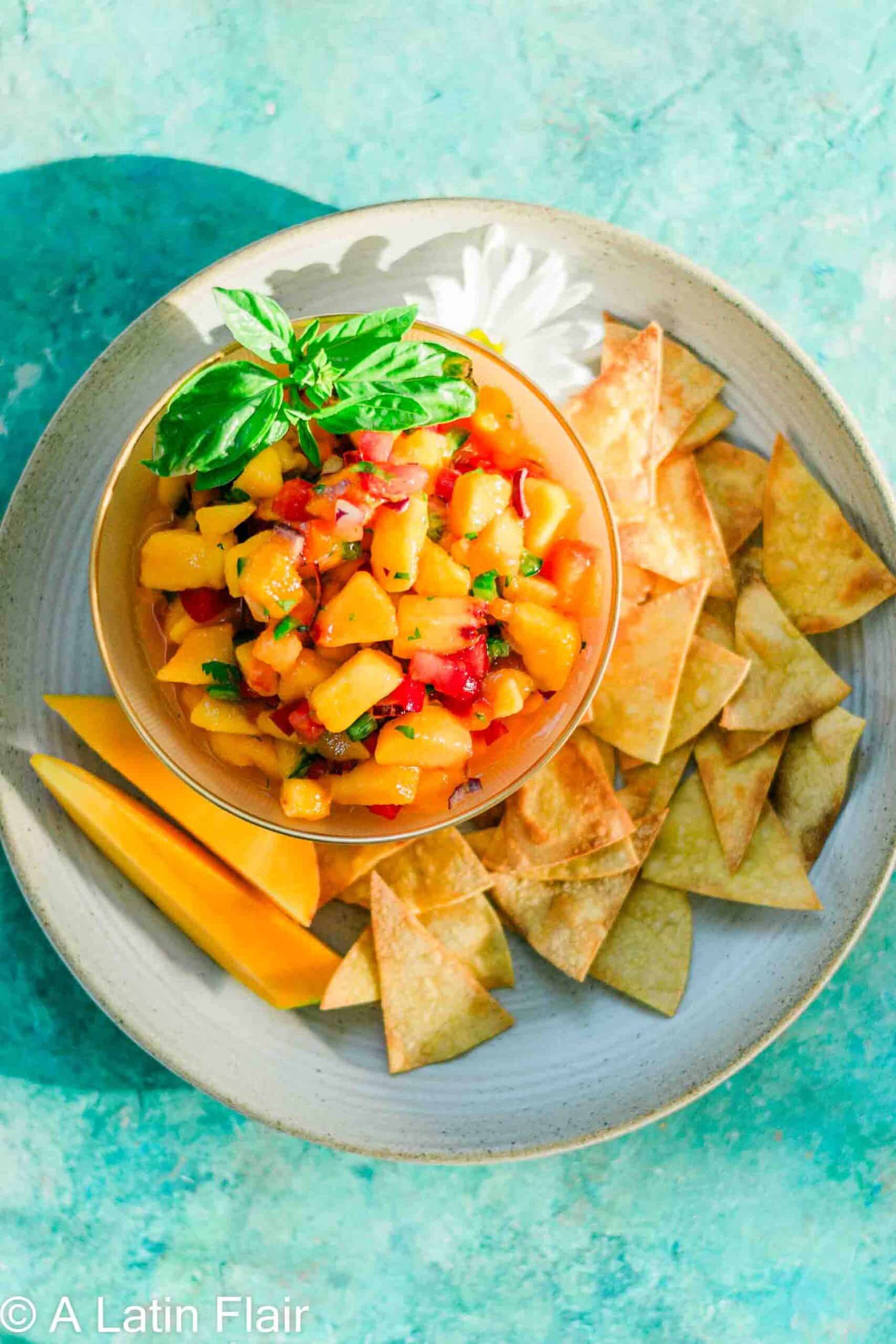 A bowl of peach mango salsa