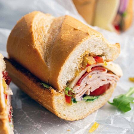 A piece of an Italian sandwich.