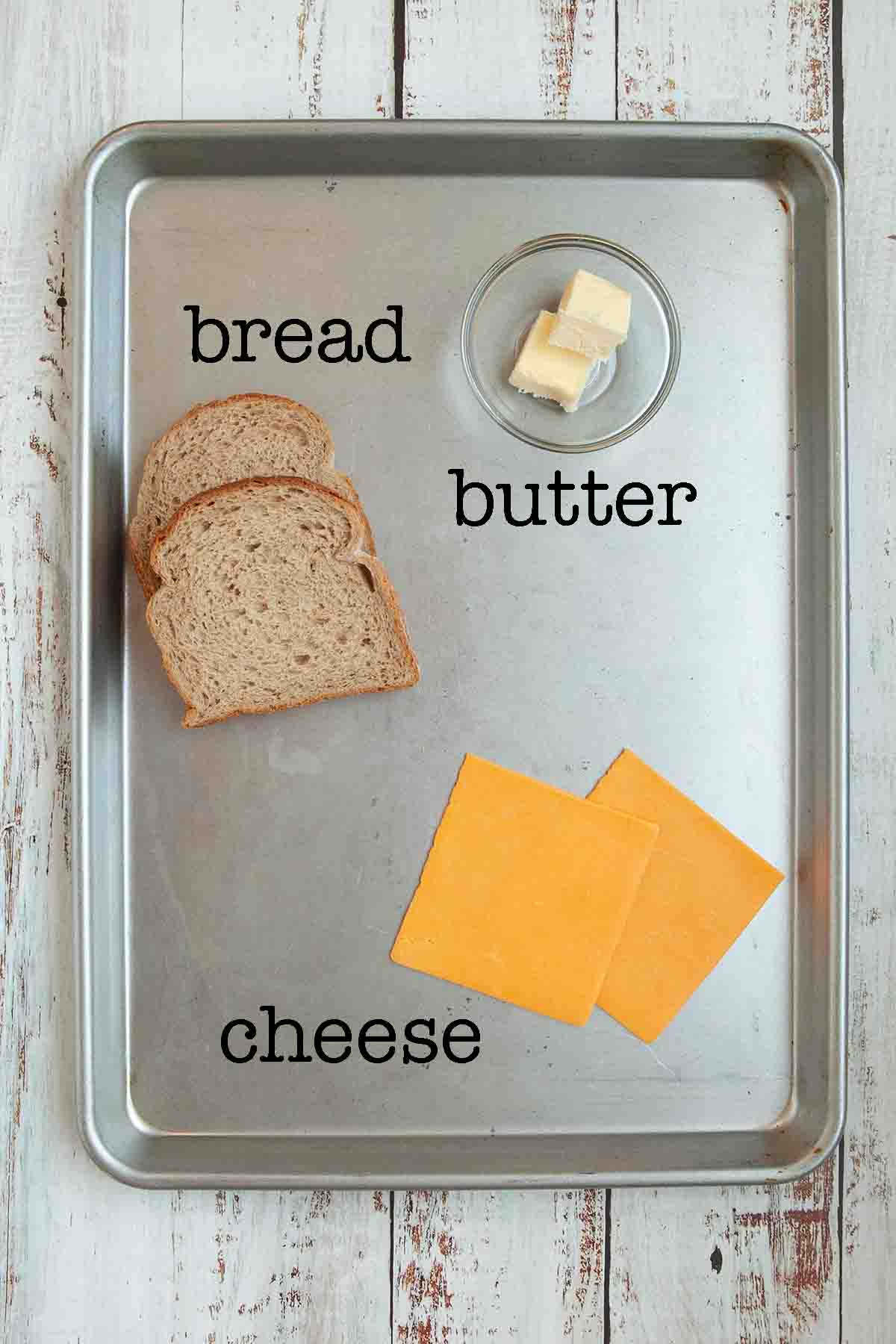 Ingredients for campfire grilled cheese--bread, butter, and cheese.