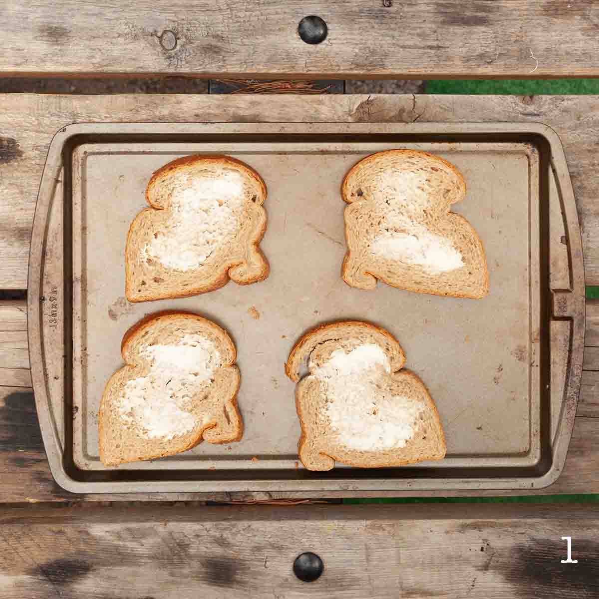 Four slices of buttered bread.
