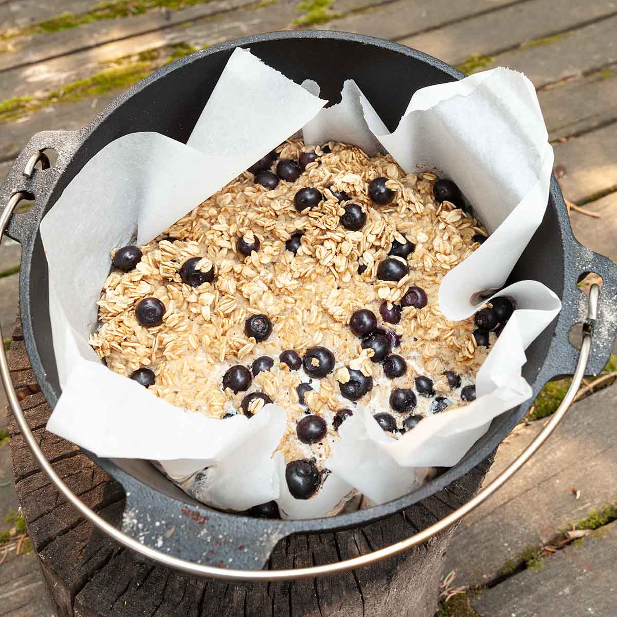 Baked oatmeal with blueberries in a cast iron Dutch oven.