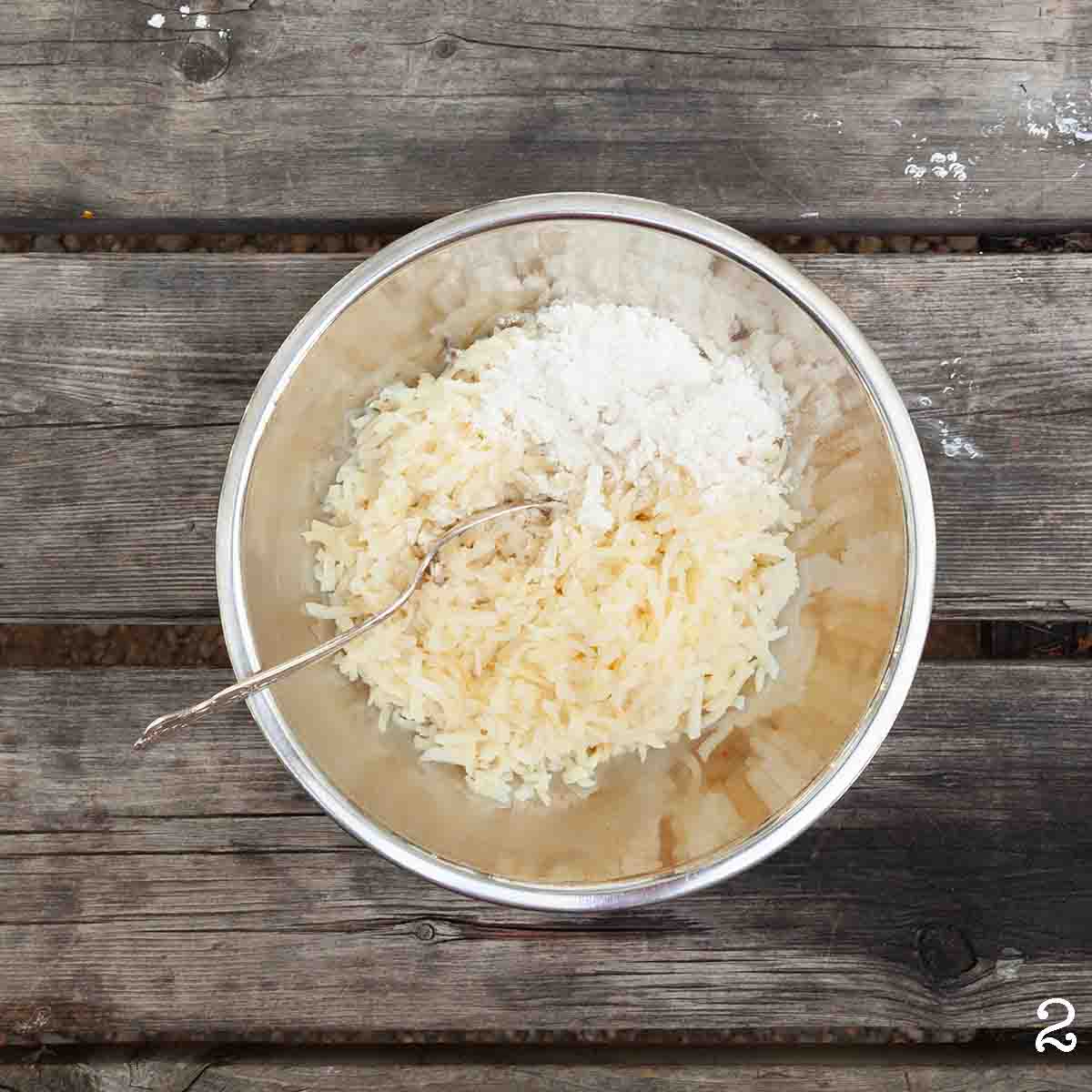 Shredded hash browns mixed with flour and egg.